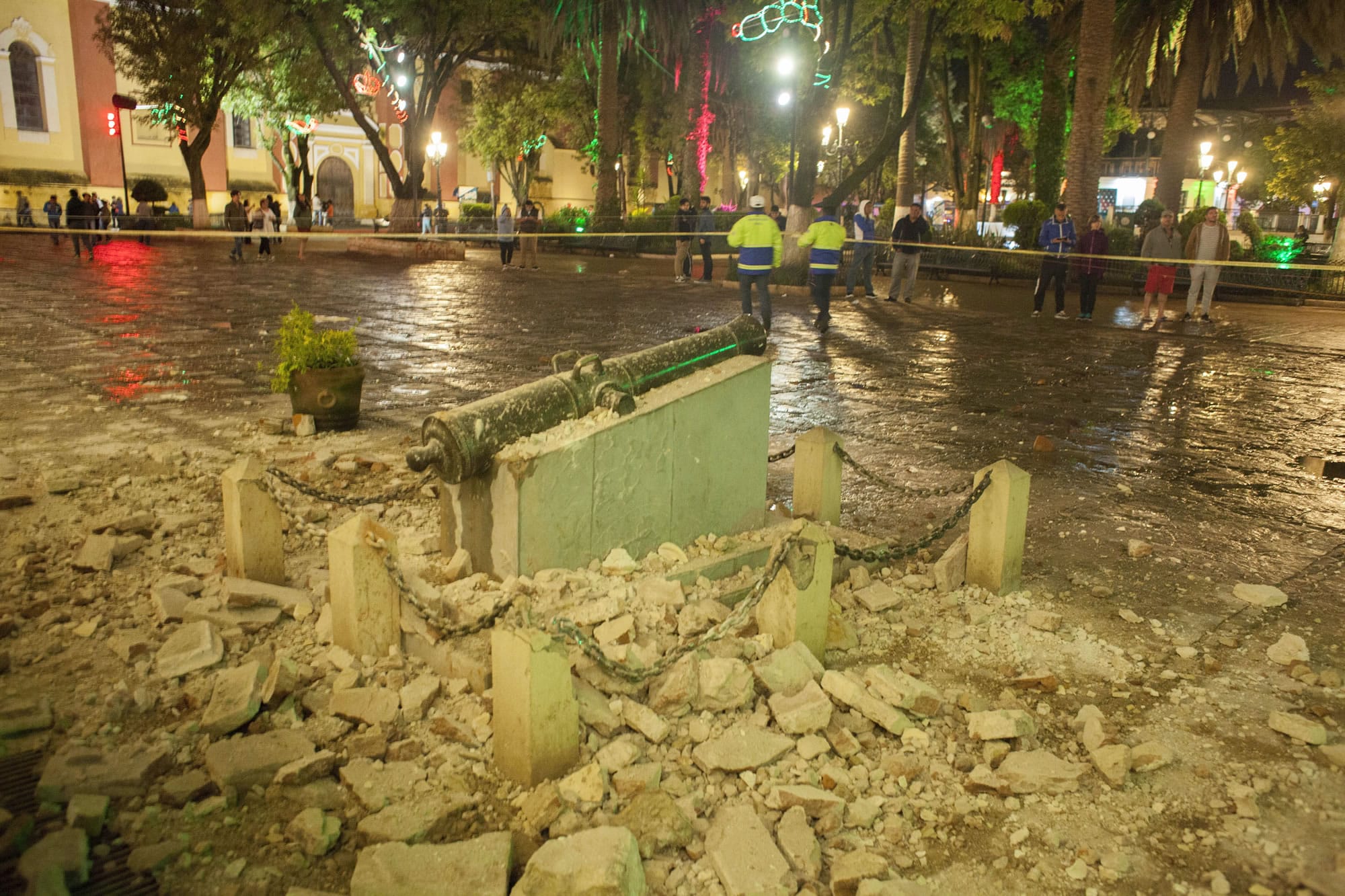 A monument surrounded by debris is cordoned off in the aftermath of an 8.1-magnitude earthquake in San Cristobal de Las Casas, state of Chiapas, Mexico, early Friday, Sept. 8, 2017. One of the most powerful earthquakes ever to strike Mexico hit off its southern coast, killing at least 15 people, toppling houses and businesses and sending panicked people into the streets.