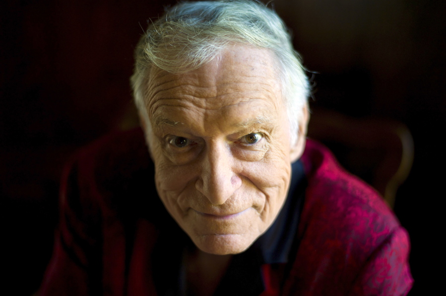 American magazine publisher, founder and Chief Creative Officer of Playboy Enterprises, Hugh Hefner at his home at the Playboy Mansion in Beverly Hills, Calif. Playboy magazine founder and sexual revolution symbol Hefner has died at age 91. The magazine released a statement saying Hefner died at his home of natural causes on Wednesday night, Sept. 27, 2017, surrounded by family.