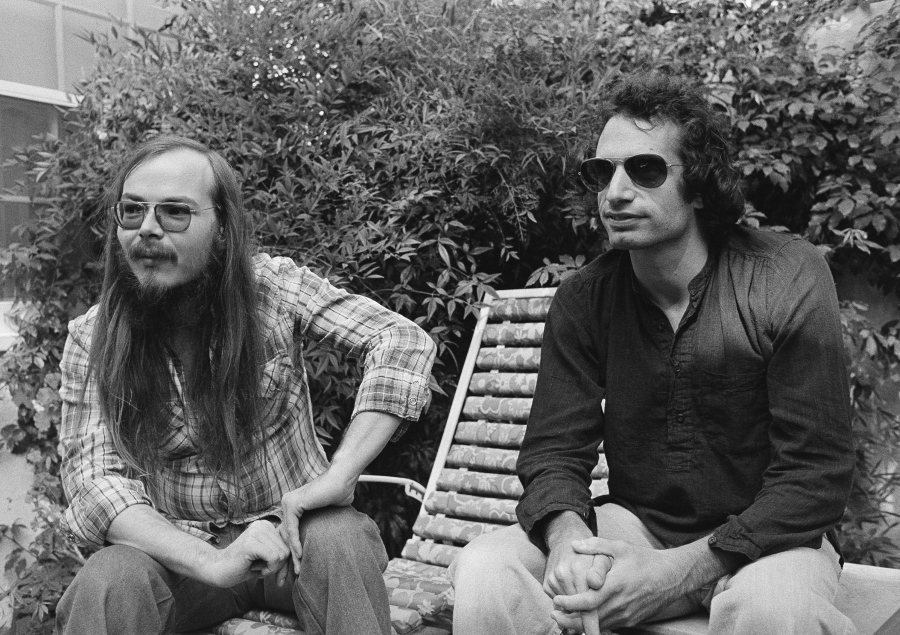 Walter Becker, left, and Donald Fagen of Steely Dan, sit in 1977 in Los Angeles. Becker, the guitarist, bassist and co-founder of the rock group Steely Dan, has died. He was 67. His official website announced his death Sunday with no further details.