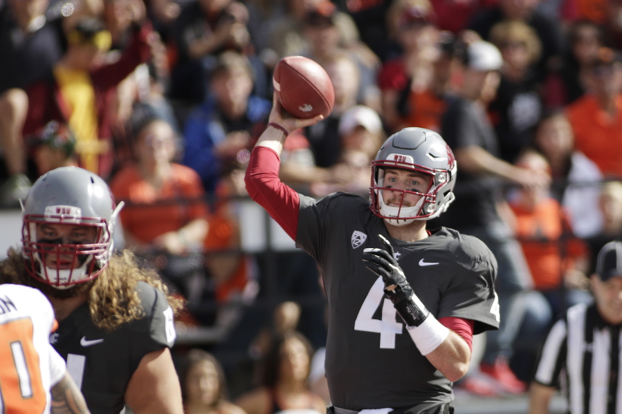 Washington State quarterback Luke Falk (4) throws a pass during the first half of an NCAA college football game against Oregon State in Pullman, Wash., Saturday, Sept. 16, 2017.