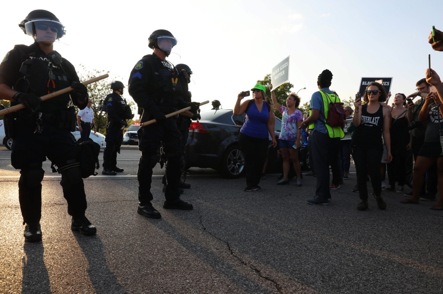 St. Louis County police say they broke up a demonstration near an upscale mall because protesters weren’t listening to instructions and tried to evade two lines of officers blocking the on-ramp to a highway Wednesday in St. Louis. Protests have taken place since Friday’s acquittal of a white former St. Louis police officer for the fatal shooting of black drug suspect. (Christian Gooden/St.