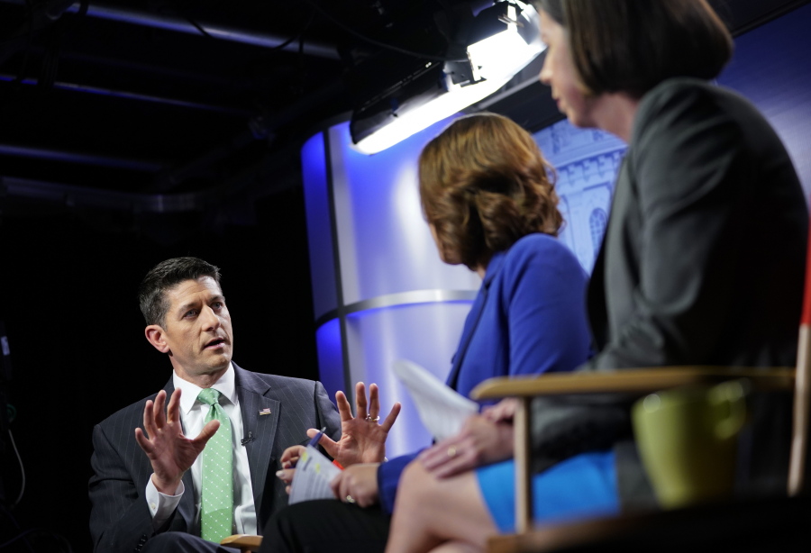 House Speaker Paul Ryan of Wisconsin answers questions Wednesday during an interview with Associated Press reporters Julie Pace and Erica Werner, at the Associated Press bureau in Washington.