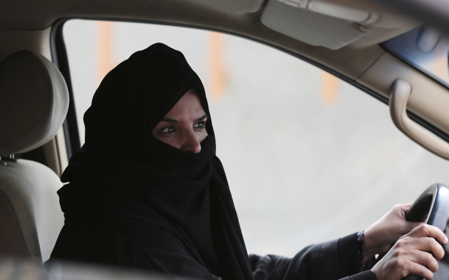 A woman drives a car on a highway in Riyadh, Saudi Arabia, as part of a campaign to defy Saudi Arabia’s ban on women driving. Saudi Arabia authorities announced Tuesday Sept. 26, 2017, that women will be allowed to drive for the first time in the ultra-conservative kingdom from next summer, fulfilling a key demand of women’s rights activists who faced detention for defying the ban.