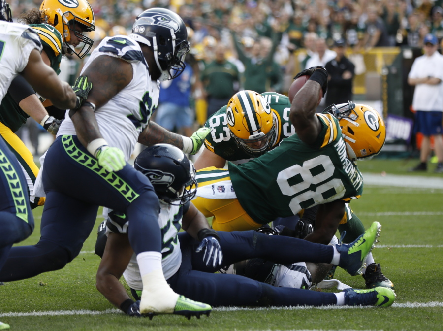 Green Bay Packers’ Ty Montgomery runs for a touchdown during the second half of an NFL football game against the Seattle Seahawks Sunday, Sept. 10, 2017, in Green Bay, Wis.