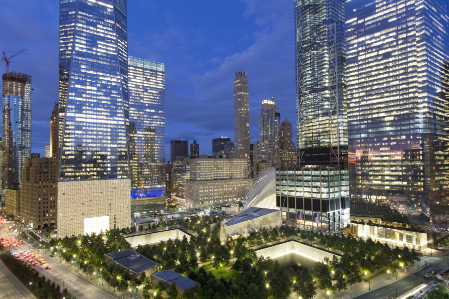 The National September 11 Memorial and Museum, bottom, is surrounded by high-rise towers in New York.