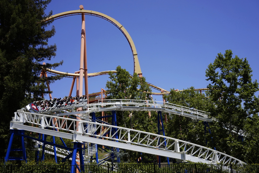 Riders enjoy The New Revolution at Six Flags Magic Mountain in Valencia, Calif.