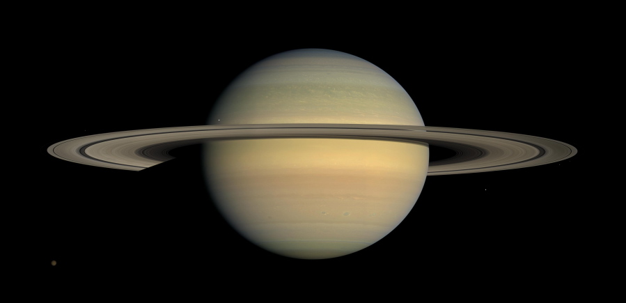 This July 23, 2008 image made available by NASA shows the planet Saturn, as seen from the Cassini spacecraft. After a 20-year voyage, Cassini is poised to dive into Saturn on Friday, Sept. 15, 2016.