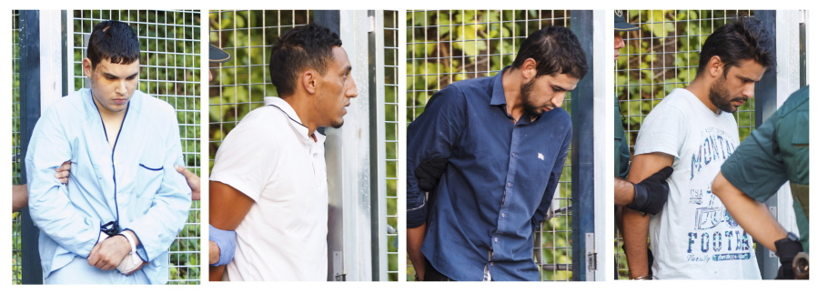 FILE - In this Tuesday, Aug. 22, 2017 combination file photo, four un-named alleged members of a terror cell accused of killing 15 people in attacks in Barcelona leaves a Civil Guard base on the outskirts of Madrid before appearing in court in Madrid, Spain, The investigation into last month’s attacks in Spain is becoming increasingly international. Among the focus of authorities are plane tickets to Brussels, a lightning trip to Paris and an itinerant imam who went from trafficking people and drugs to secretly preaching jihad to young Muslims in northeastern Spain.
