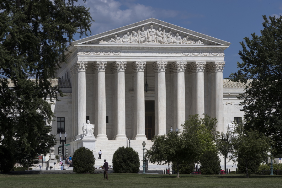The Supreme Court is seen in Washington. A Supreme Court with a reconstituted conservative majority is taking on a new case with the potential to financially cripple Democratic-leaning labor unions that represent government workers. The justices deadlocked 4-4 in a similar case last year. (AP Photo/J.
