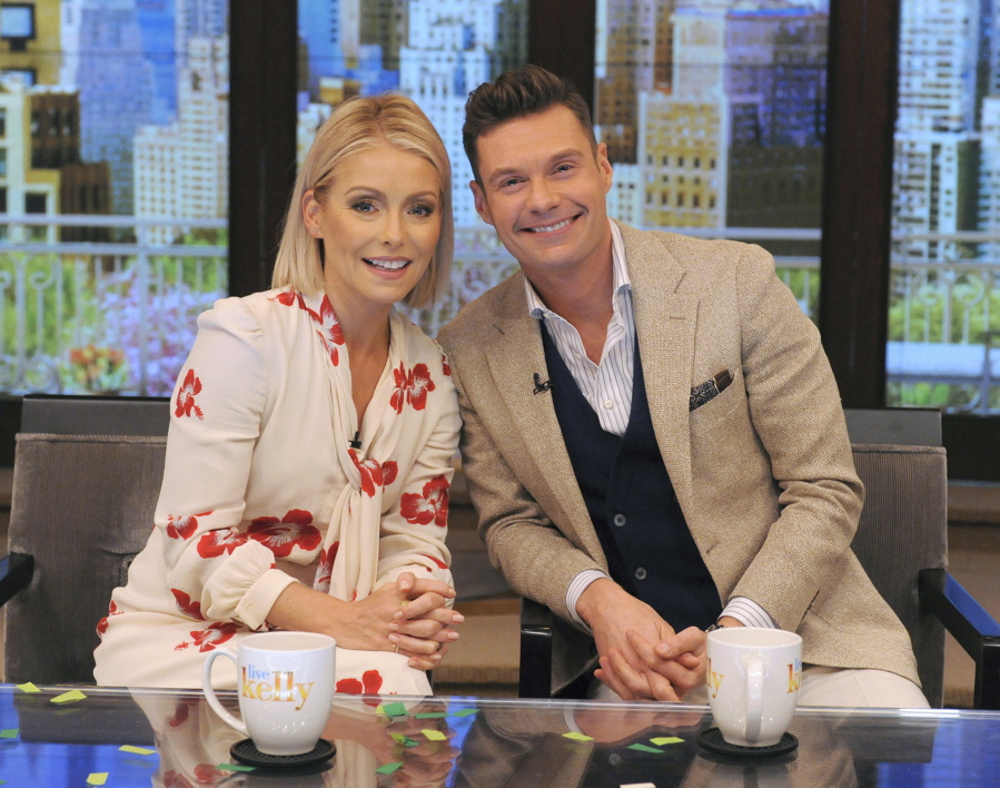 Kelly Ripa and Ryan Seacrest pose May 1 at “Live” in New York. On Monday, Sept. 4, “Live with Kelly and Ryan” launches a new season, its 30th in national syndication.