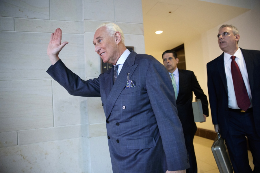 Longtime Donald Trump associate Roger Stone arrives to testify behind closed-doors as part of the House Intelligence Committee’s investigation into Russian meddling in the 2016 election, on Capitol Hill in Washington, Tuesday. (AP Photo/J.