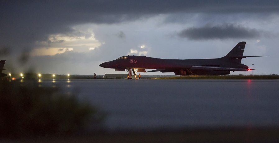 In this photo made available by the Department of Defense, a U.S. Air Force B-1B Lancer, assigned to the 37th Expeditionary Bomb Squadron, deployed from Ellsworth Air Force Base, S.D., prepares to take off from Andersen AFB, Guam, on Saturday, Sept. 23, 2017. The Pentagon says B-1B bombers from Guam and F-15 fighter escorts from Okinawa, Japan, have flown a mission in international airspace over the waters east of North Korea. (Staff Sgt. Joshua Smoot/U.S.
