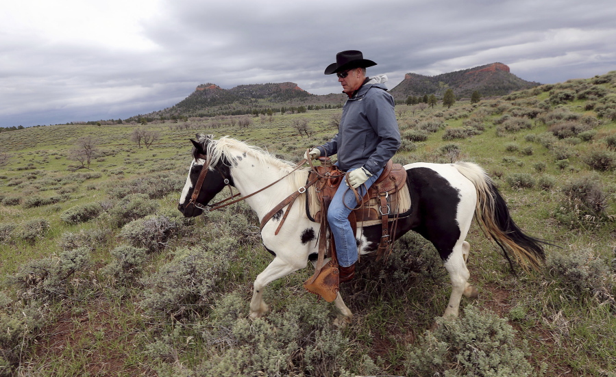 Interior Secretary Ryan Zinke rides a horse in the new Bears Ears National Monument near Blanding, Utah. Zinke has closely followed his boss’ playbook, encouraging mining and drilling on public lands and size reductions for national monuments that President Donald Trump said were part of a “massive land grab.” Yet Zinke’s made an exception in his home state of Montana.