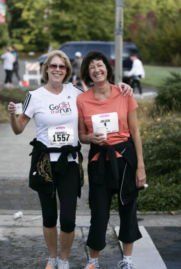 Provided by Joleen Skarberg Joleen Skarberg, right, and her sister, Dawnell Stirkins, run the Girlfriends Run for a Cure half marathon.