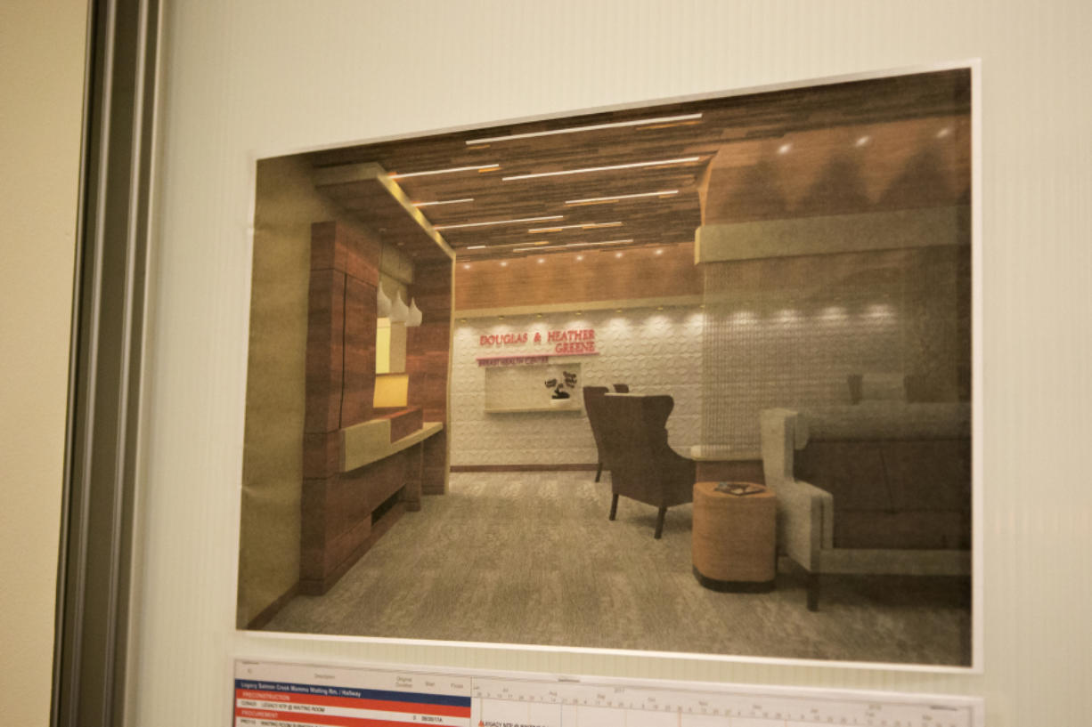 A rendering of the new breast health center is posted on the entrance of the under-construction reception area at Legacy Salmon Creek Medical Center in September. The completed center will open in early November.