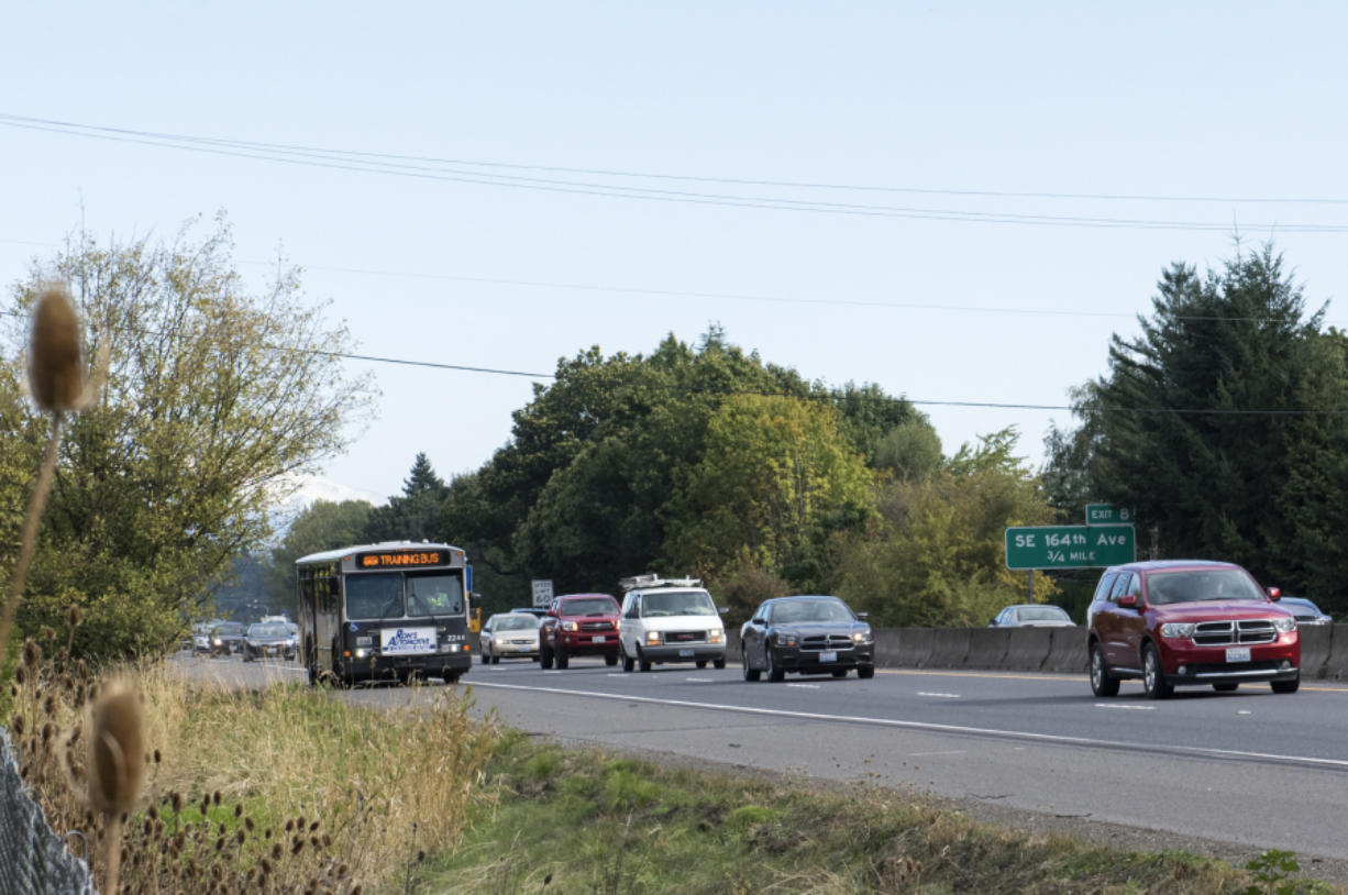 A C-Tran bus drives along the shoulder of state Highway 14 on Wednesday afternoon. An upcoming pilot project will allow buses to drive on the highway shoulder between Interstate 205 and Southeast 164th Avenue during periods of high congestion.