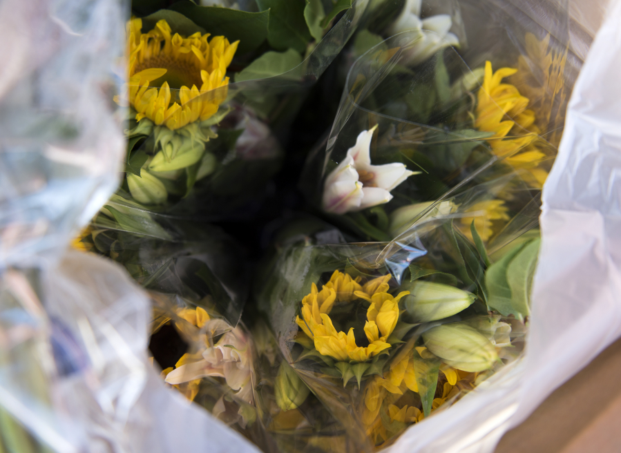 Holland America Flowers handed out 200 bouquets in Woodland and Battle Ground on Wednesday afternoon for Society of American Florists’ national event, Petal it Forward.