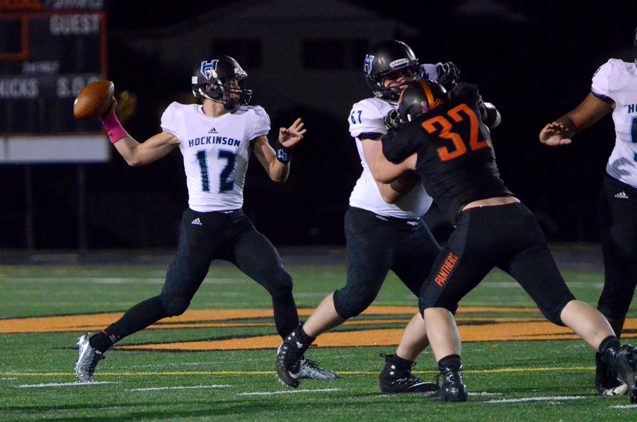 Hockinson quarterback Canon Raconelli makes a pass against Washougal at Washougal High School on Friday, October 6, 2017.