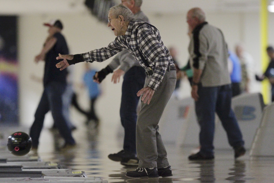 Ray Olsen, 94, of Portland was the oldest bowler competing Saturday at the 48th annual Old Timers Bowling Tournament at Allen's Crosley Lanes in Vancouver. The 40-team tournament open to bowlers 50 and older was taking place in Vancouver for the second year after starting in Portland in 1969.