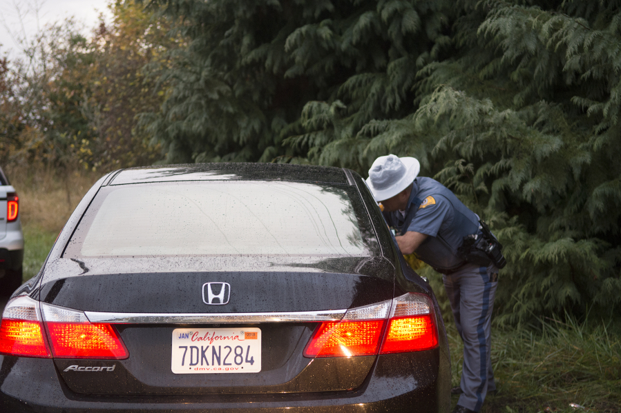 Washington State Patrol Trooper Richard Thompson and the License Patrol Unit were out at two Battle Ground School District schools Friday morning looking for drivers with out-of-state license plates.