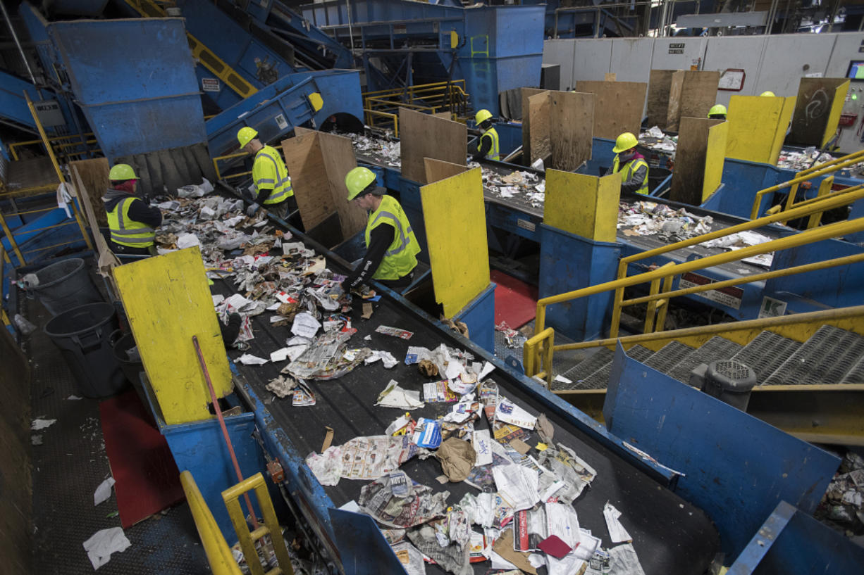 Although workers hand-sort recyclables on conveyor belts at the West Vancouver Materials Recovery Center, some contaminating materials make their way through to the final product.