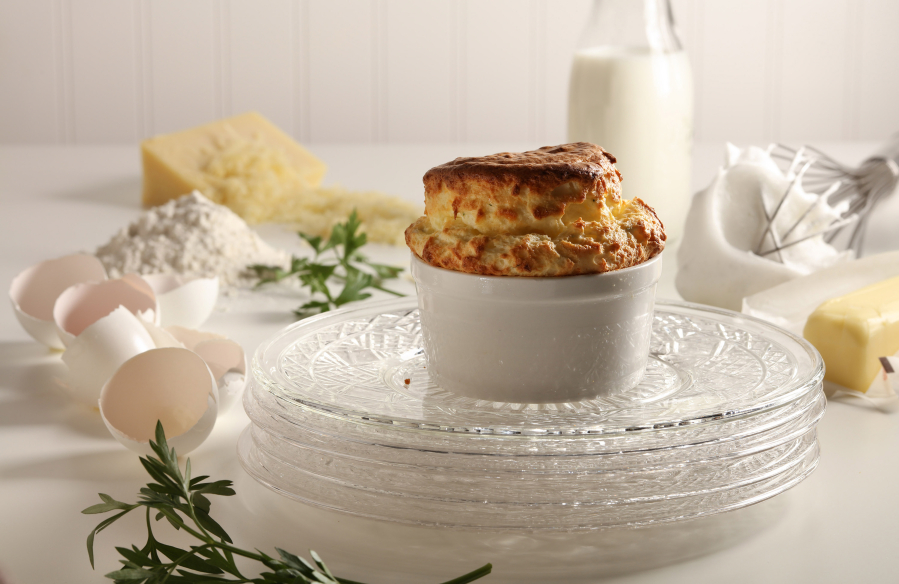 Souffles, besides being delicious and deceptively easy to pull off, are totally old school, classy with a delicate strength, like Audrey Hepburn in a ramekin.