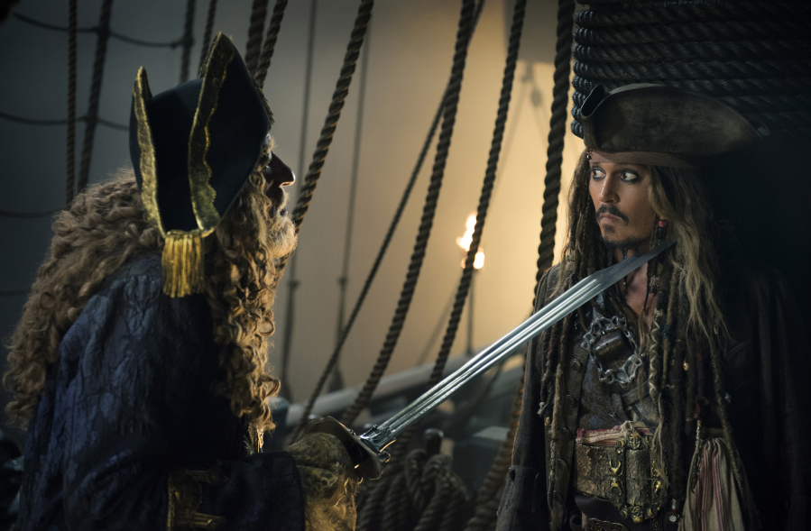 Geoffrey Rush plays Barbossa, left, and Johnny Depp is Capt.