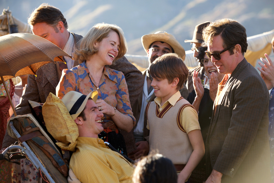In “Breathe,” Andrew Garfield, foreground, portrays disability advocate Robin Cavendish with, from left, Hugh Bonneville, Claire Foy, Harry Marcus and Tom Hollander.