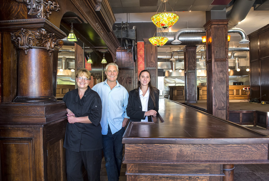 Kitchen manager Tehri Ashe, left, project manager Craig Dieffenbach and general manager Sharon Walker, right, are all pleased with the progress in remaking the restaurant at the Monticello Hotel in Longview.