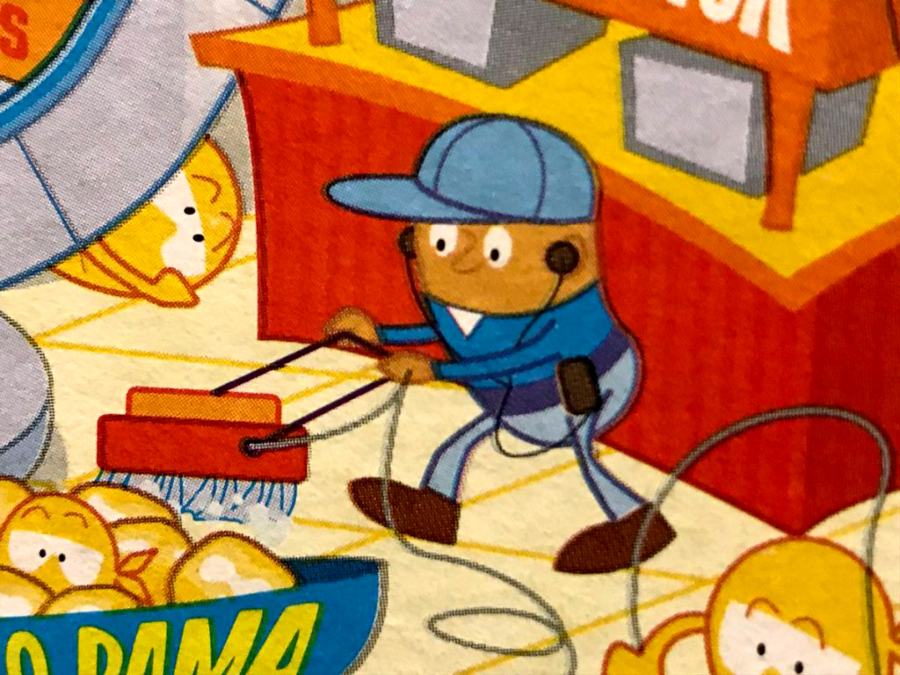 On the back of the box, all the Corn Pops characters were yellow, save one brown figure, who happened to be the floor-sweeping janitor.