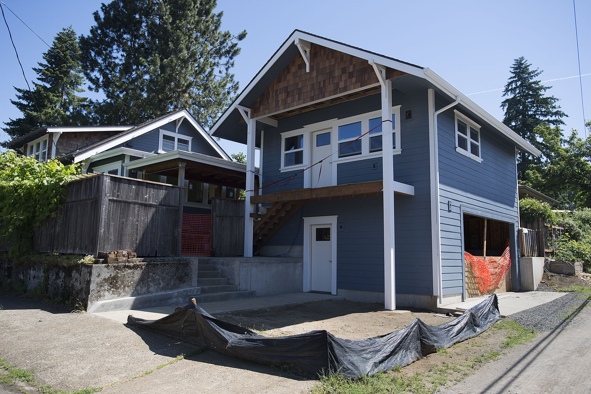 An accessory dwelling unit, right, under construction in June near a home in the Carter Park neighborhood. Vancouver, which recently revised its building code, has 65 ADUs, says Colete Anderson, a member of Clark County's planning staff. The county has allowed for ADUs since 1993, but the county has documented only 22 ADUs in the unincorporated Vancouver urban growth area, a county fact sheet says.