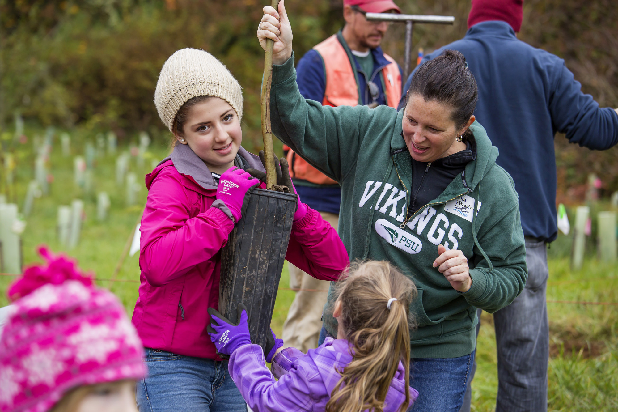 More than 200 volunteers helped Clark Public Utilities' StreamTeam plant 1,013 trees during the Make a Difference Day event at Washington State University Vancouver in 2013.