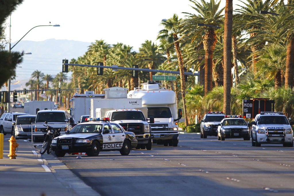 Police block a street outside of the Route 91 Harvest music festival Monday, Oct. 2, 2017, in Las Vegas. A mass shooting occurred late night Sunday at a music festival on the Las Vegas Strip.