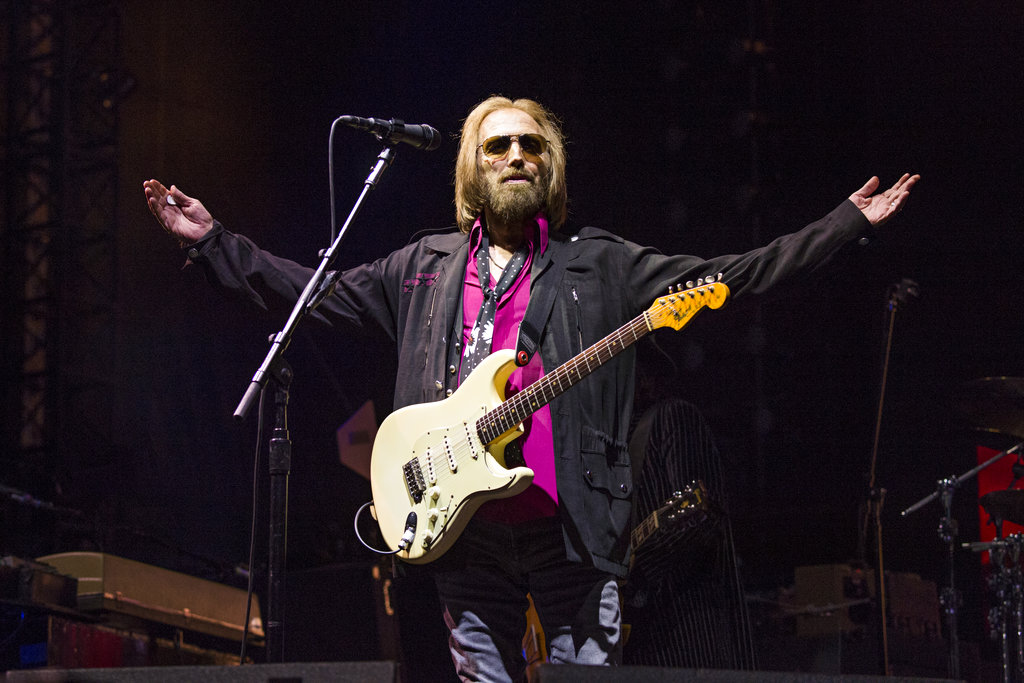 FILE - In this Sept. 17, 2017 file photo, Tom Petty of Tom Petty and the Heartbreakers appears at KAABOO 2017 in San Diego, Calif. A spokesman for the Los Angeles Police Department says it has no information on the well-being of Tom Petty and its spokespeople did not provide info CBS News used to report the rocker had died. News outlets reported Monday, Oct. 2, that Petty was dead at age 66. CBS did not cite a source in its story, but tweeted that LAPD confirmed Petty’s death.