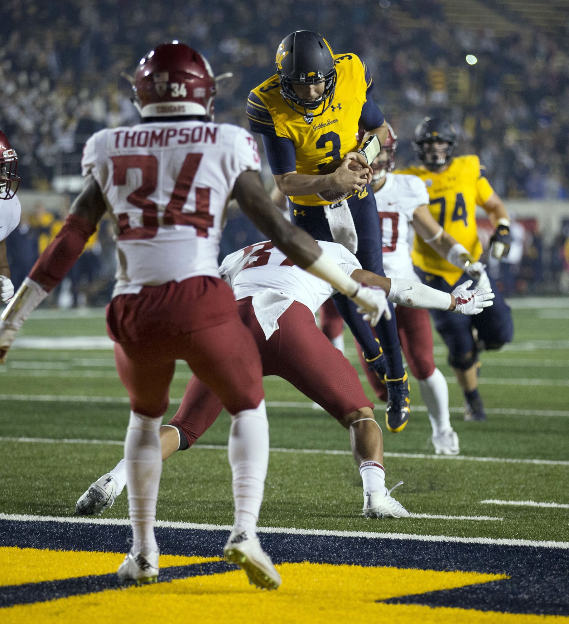 California's Ross Bowers (3) vaults into the end zone for a touchdown against Washington State during the fourth quarter of an NCAA college football game, Friday, Oct. 13, 2017, in Berkeley, Calif. The Golden Bears upset the eight-ranked Cougars, 37-3. (AP Photo/D.