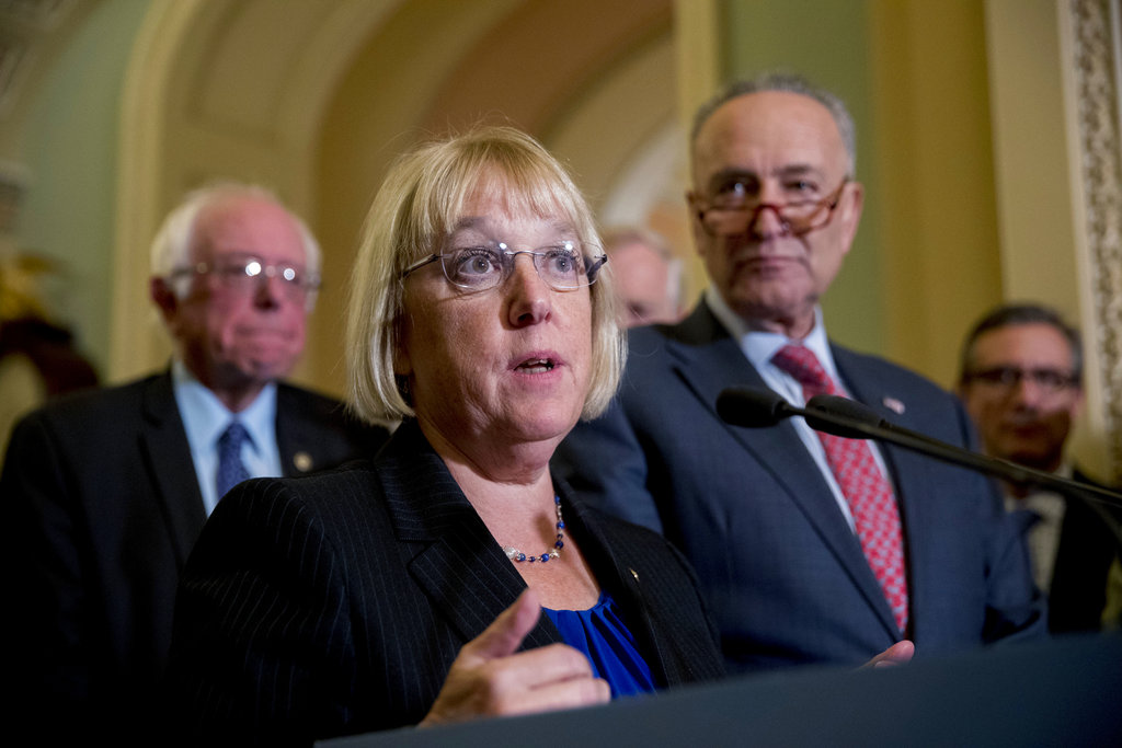 Sen. Patty Murray, D-Wash., accompanied by Sen. Bernie Sanders, I-Vt., left, and Senate Minority Leader Sen. Chuck Schumer of N.Y., right, speaks to reporters on Capitol Hill in Washington, Tuesday, Oct. 17, 2017, after she and Sen. Lamar Alexander, R-Tenn., say they have the "basic outlines" of a bipartisan deal to resume payments to health insurers that President Donald Trump has blocked.