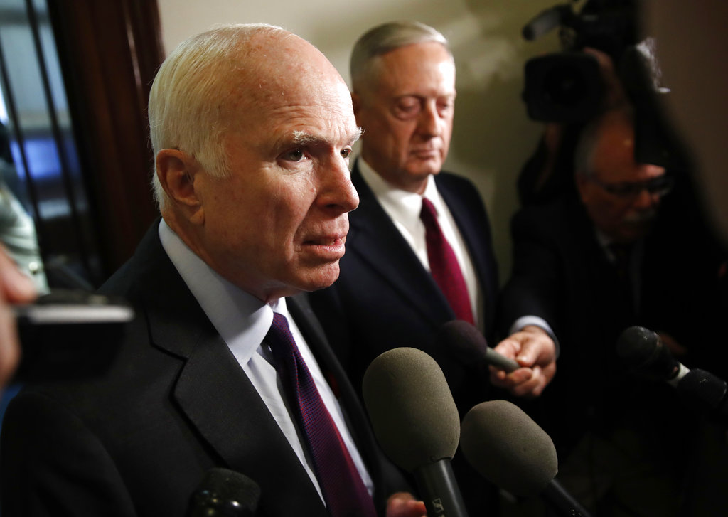 Sen. John McCain, R-Ariz., left, and Defense Secretary James Mattis, speak to members of the media after their meeting Friday, Oct. 20, 2017, on Capitol Hill in Washington.