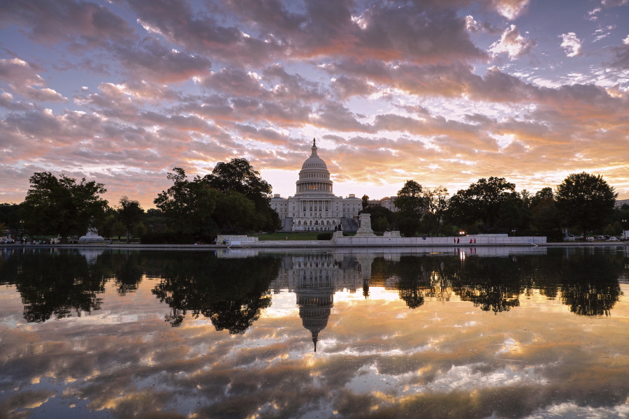 The Capitol is seen at sunrise, in Washington, Tuesday. (AP Photo/J.