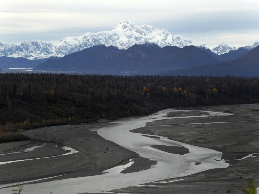 In this Sunday, Oct. 1, 2017 North America’s tallest peak, Denali, is seen from a turnout in Denali State Park, Alaska. The peak was renamed from Mount McKinley to Denali under President Barack Obama. Alaska U.S. Sen. Dan Sullivan recently said he and Sen. Lisa Murkowski told President Donald Trump they support keeping the name Denali.