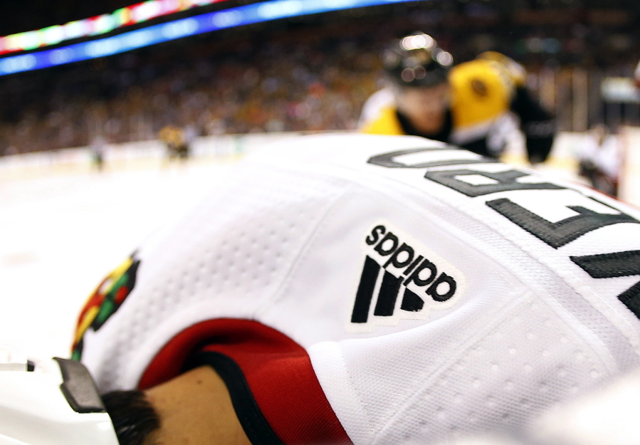 A Chicago Blackhawks Adidas game shirt is seen in the corner during the third period of the Boston Bruins 4-2 win over the Chicago Blackhawks in Boston on Sept. 25.
