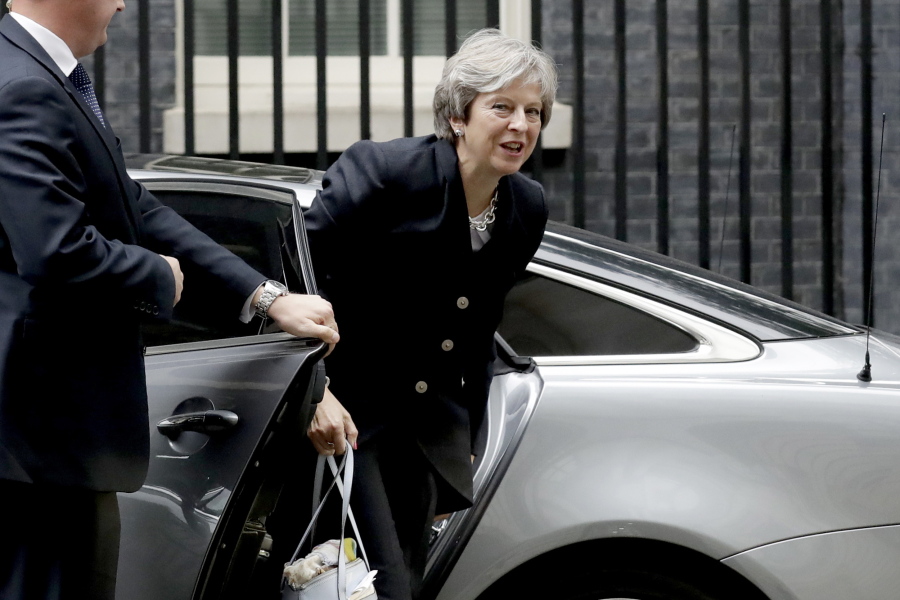 British Prime Minister Theresa May arrives at 10 Downing Street on Monday in London. May says she is “resilient” despite a difficult speech at the Conservative Party conference and growing threats to her leadership.