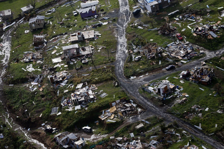 Destroyed communities are seen Sept. 28 in the aftermath of Hurricane Maria in Toa Alta, Puerto Rico. The House is on track to backing President Donald Trump’s request for billions more in disaster aid, $16 billion to pay flood insurance claims and emergency funding to help the cash-strapped government of Puerto Rico stay afloat. The hurricane aid package Thursday totals $36.5 billion and sticks close to a White House request, ignoring - for now - huge demands from the powerful Florida and Texas delegations, who together pressed for some $40 billion more.