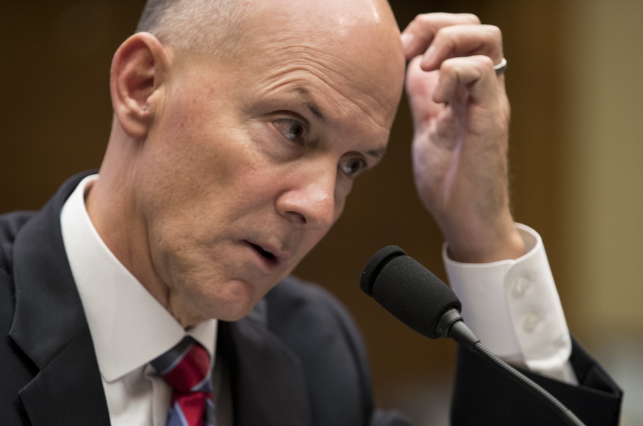 Former chairman and CEO of Equifax Richard F. Smith, scratches his head as he testifies before the Digital Commerce and Consumer Protection Subcommittee of the House Commerce Committee on Capitol Hill in Washington, Tuesday, Oct. 3, 2017.