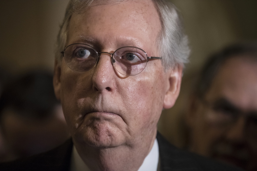 Senate Majority Leader Mitch McConnell, R-Ky., listens to remarks during a news conference Sept. 26 at the Capitol in Washington. McConnell said Sunday, he’s willing to bring bipartisan health care legislation to the floor if President Donald Trump makes clear he supports it. (AP Photo/J.