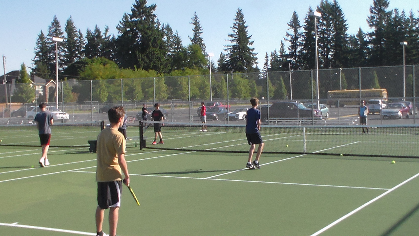 The Evergreen tennis team on the practice court (Tim Martinez/The Columbian)