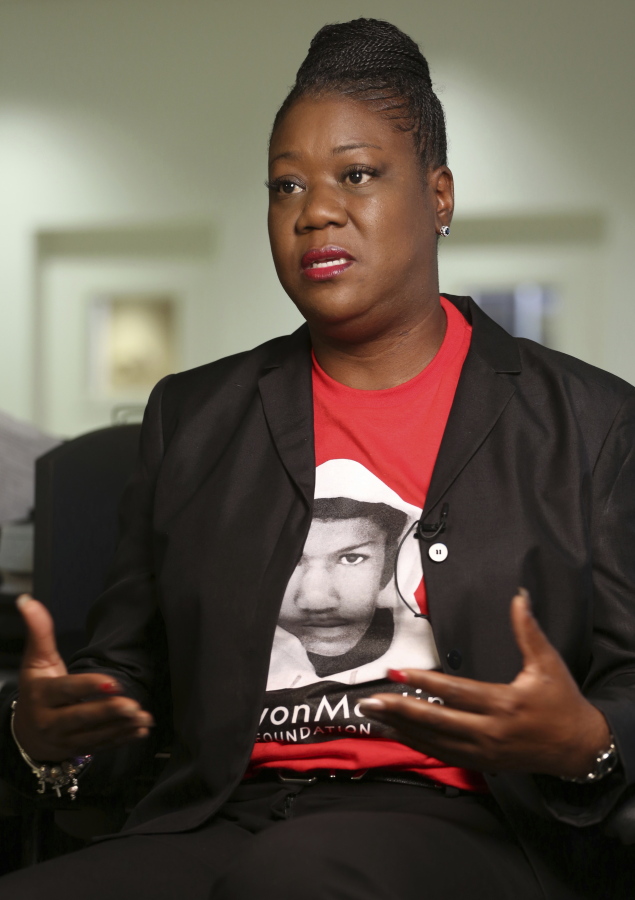 FILE- This Feb. 25, 2015 file photo shows Sybrina Fulton, mother of Trayvon Martin, in Miami. Fulton is against a line of insurance offered by the NRA for gun owners to cover not only civil liability but costs associated with any criminal charges whenever a gun owner uses their firearm in what they call a self-defense or stand your ground case.