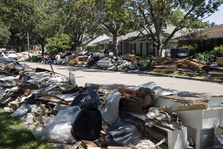 One month after Harvey dumped record rainfall in the Houston area, many suburbs of the nation’s fourth largest city continue cleaning up after the storm.