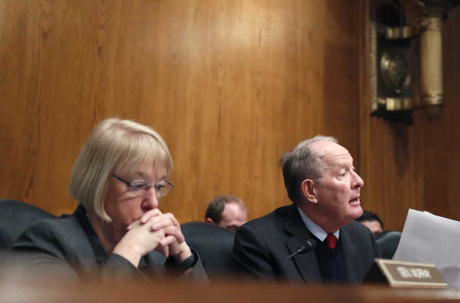 Senate Health, Education, Labor, and Pensions Committee Chairman Sen. Lamar Alexander, R-Tenn., accompanied by the committee’s ranking member, Sen. Patty Murray, D-Wash., speaks on Capitol Hill in January.
