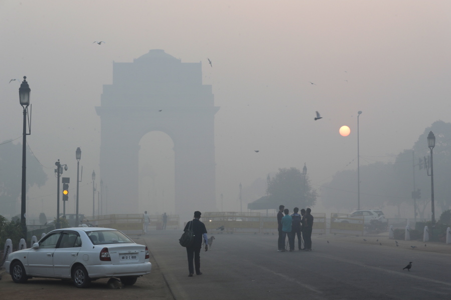 Delhi’s landmark India Gate, a war memorial, is seen engulfed in morning smog a day after Diwali festival, in New Delhi, India, Friday, Oct. 20, 2017. Environmental pollution - from filthy air to contaminated water - is killing more people every year than all war and violence in the world. One out of every six premature deaths in the world in 2015 - about 9 million - could be attributed to disease from toxic exposure, according to a major study released Thursday, Oct. 19, 2017 in The Lancet medical journal.