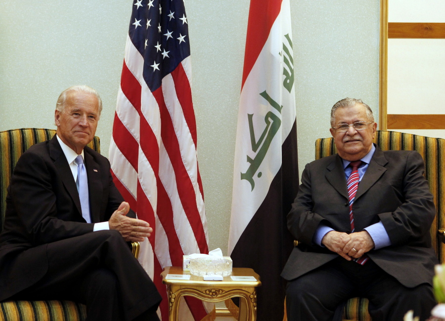 FILE - In this July 5, 2010 file photo, then U.S. Vice President Joe Biden, left, meets with then Iraqi President Jalal, Talabani, right, in Baghdad, Iraq. Talabani, a lifelong fighter for Iraq’Äôs Kurds who rose to become the country’Äôs president, presenting himself as a unifying father figure to temper the potentially explosive hatreds among Kurds, Shiites and Sunnis has died in a Berlin hospital at the age of 83.